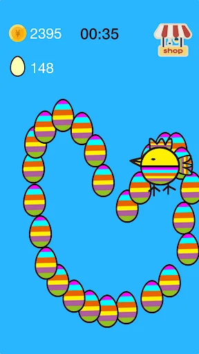 Colorful striped eggs forming circular pattern in lucky egg game. Advanced level showing 2395 points, 148 eggs, cute chicken.