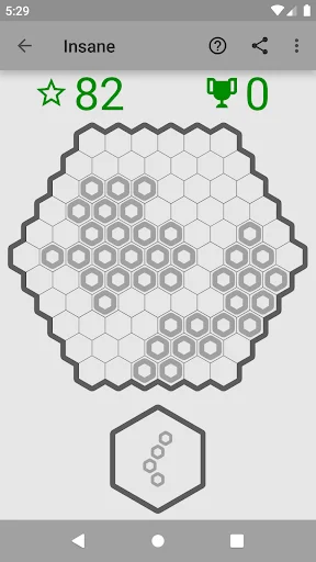 Hexa Puzzle Insane difficulty level gameplay with complex hexagonal grid, 82 stars scored, 0 trophies, 1 piece remaining