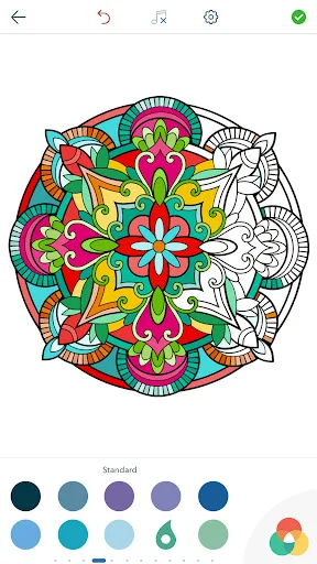 Vibrant multi-colored mandala with red border and detailed patterns displayed with standard color palette selector