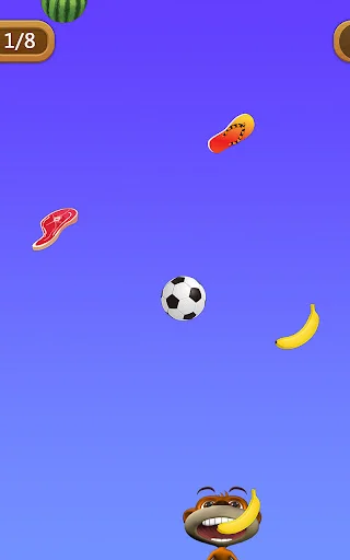 Interactive catching mini-game with Talking Monkey character collecting falling skateboard, soccer ball, banana and watermelon objects